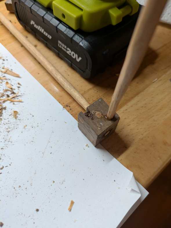 die with dowels sticking out of it