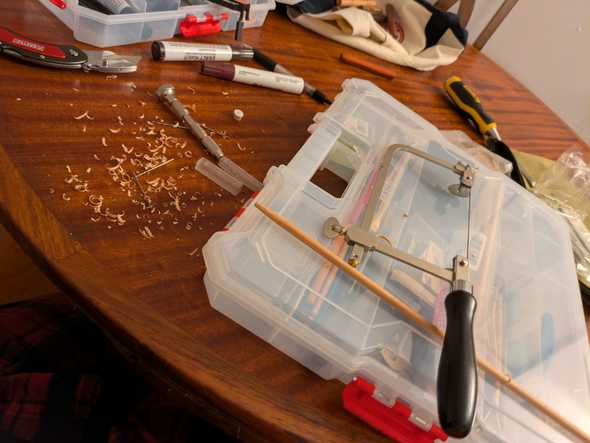 wood shavings and knife and a toolbox