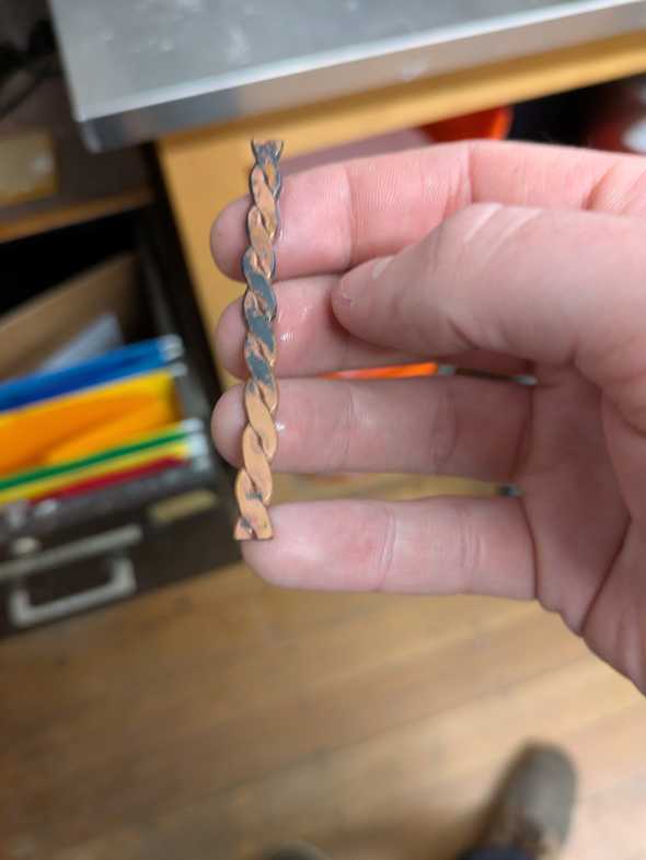 a ring band made of twisted metal