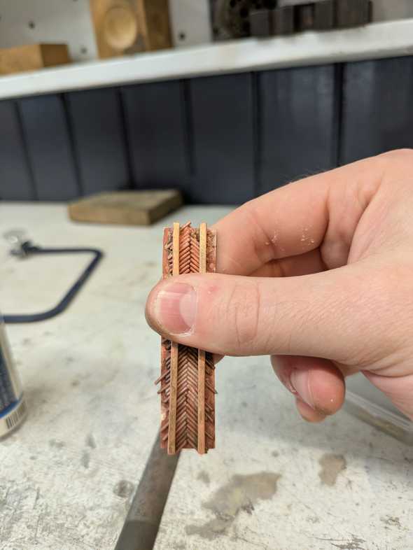 annealed brass wire in herringbone pattern with square wire on top